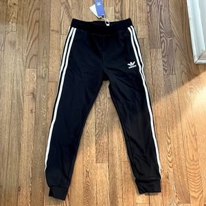 New with tags.  Kids Adidas Trefoil black and white pants.  Medium (10-12).